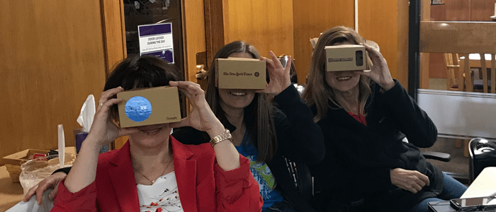 Three faculty using virtual reality headsets